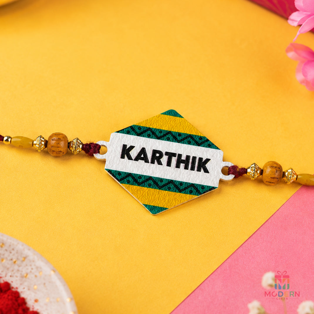 Customised name rakhi with personalised Karthik name plate and colourful traditional bead design
