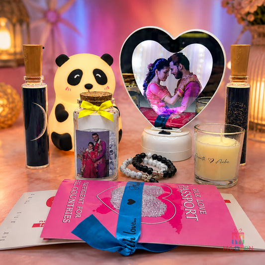 Lovely Love Combo featuring a heart-shaped LED photo lamp, personalized photo jar, panda plush toy, perfume bottles, romantic candle, bracelets, and love passport gift set.