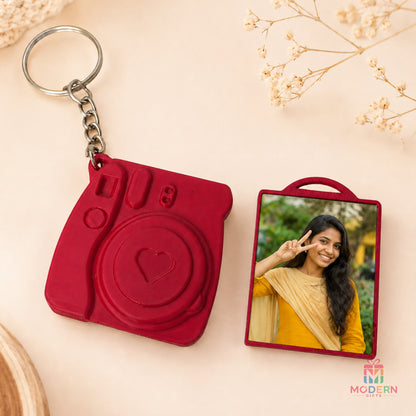 Personalized camera-shaped photo keychain featuring a custom photo and metal key ring