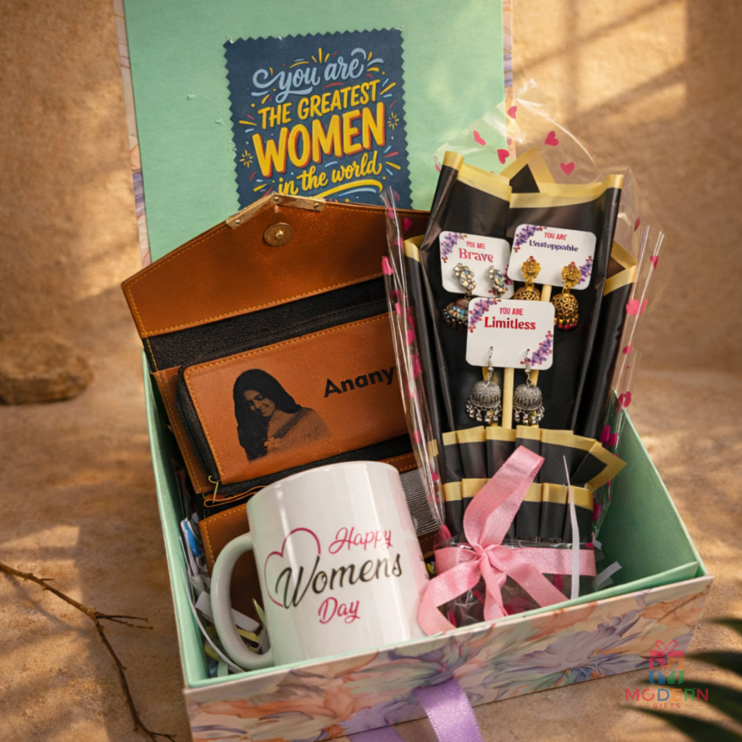 Premium Women's Day gift hamper with personalized wallet, earrings, Women's Day mug, and greeting card in a floral gift box.